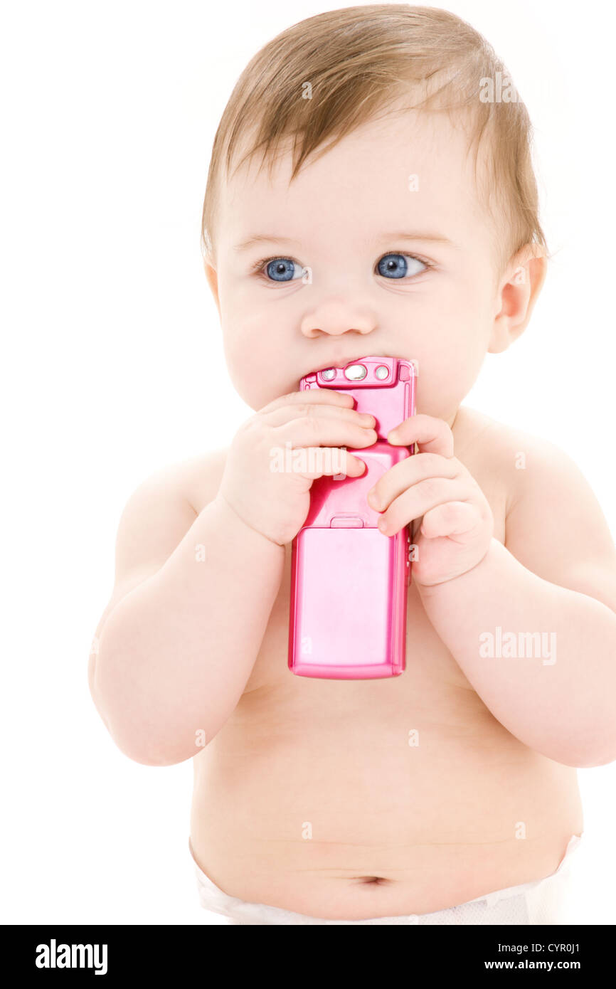 picture of baby boy in diaper with pink cell phone Stock Photo
