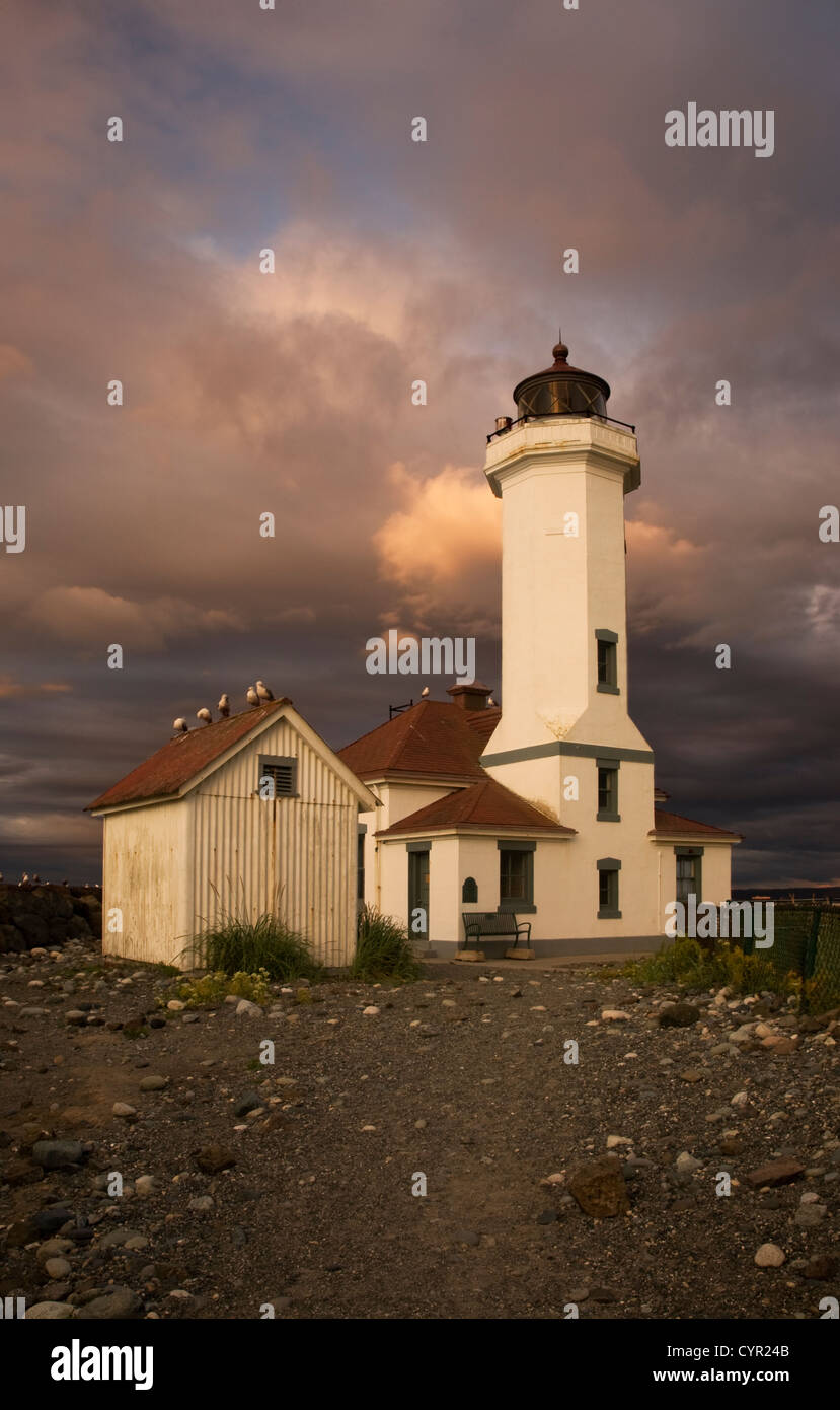 WA05802-00...WASHINGTON - Sunset at Point Wilson Light in Fort Worden State Park on Admiralty Inlet at Port Townsend. Stock Photo