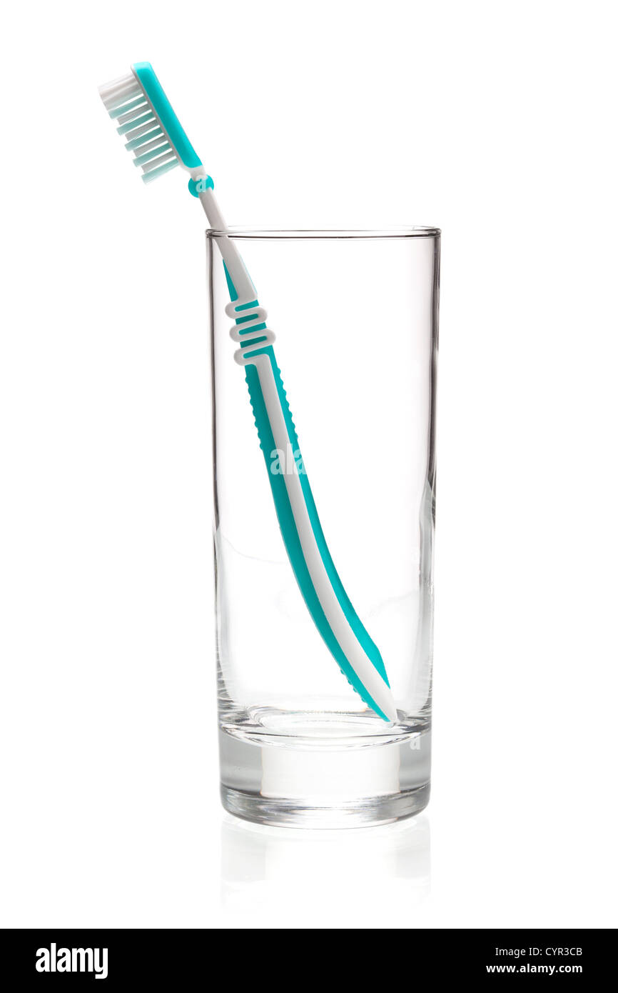 Green tooth brush in glass. Isolated on white background Stock Photo ...
