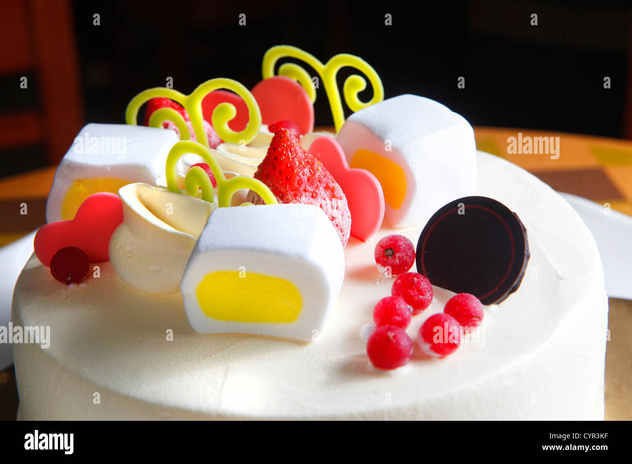 Cake with marshmallow and berry on the top Stock Photo Alamy