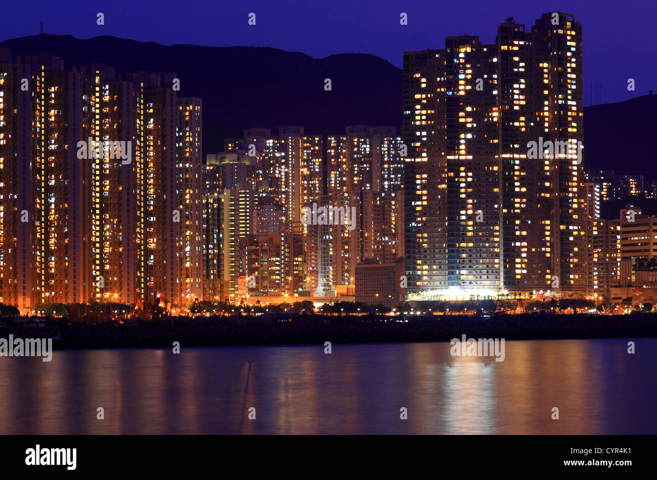 Apartment block at night in Hong Kong Stock Photo - Alamy