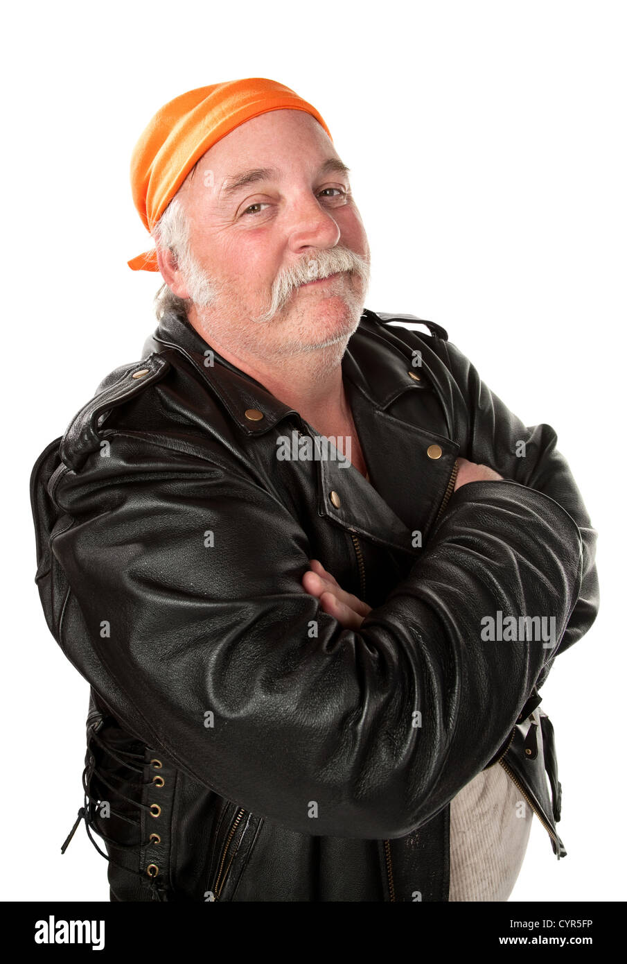 Smiling biker gang member with leather jacket Stock Photo