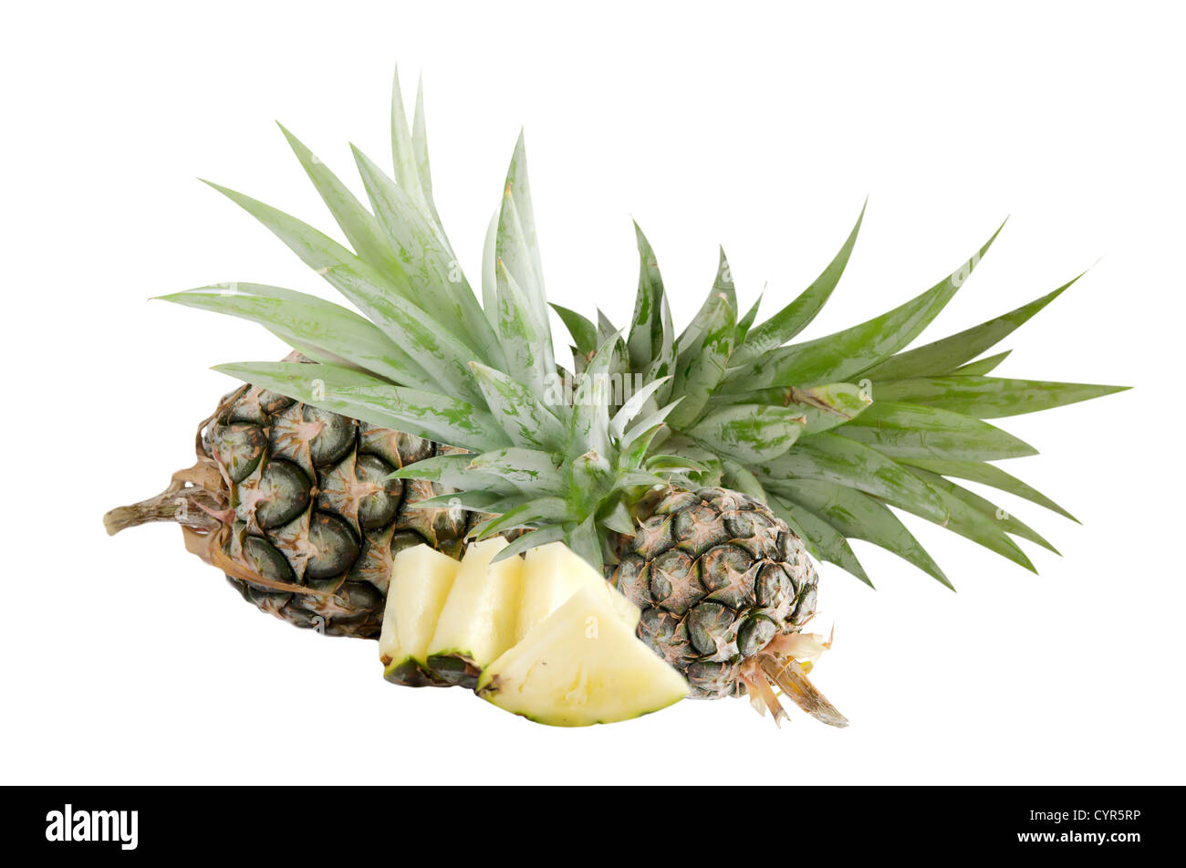 raw pineapple and piece of pineapple on white Stock Photo