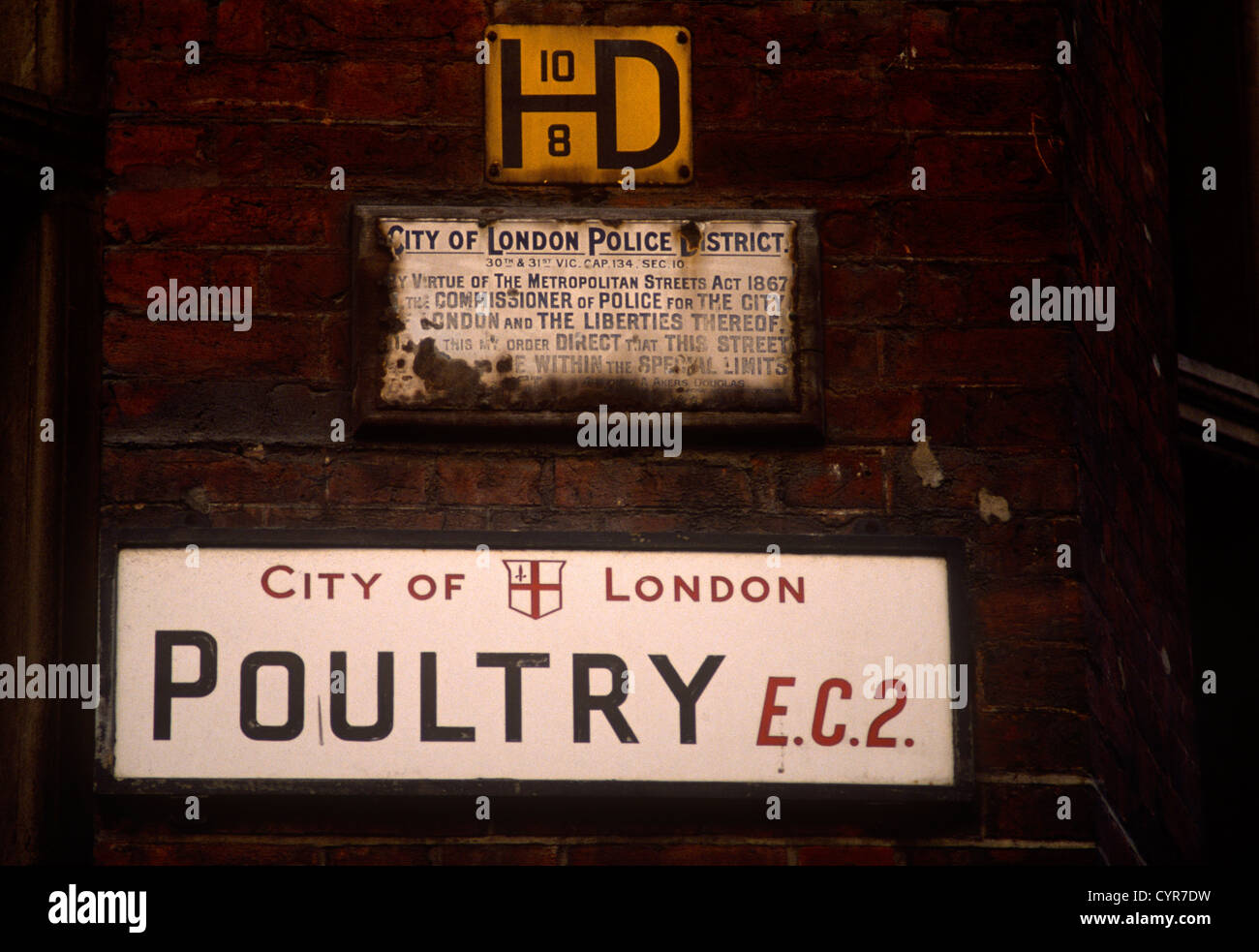 an-old-city-of-london-street-sign-for-poultry-ec2-beneath-a-rusting-CYR7DW.jpg