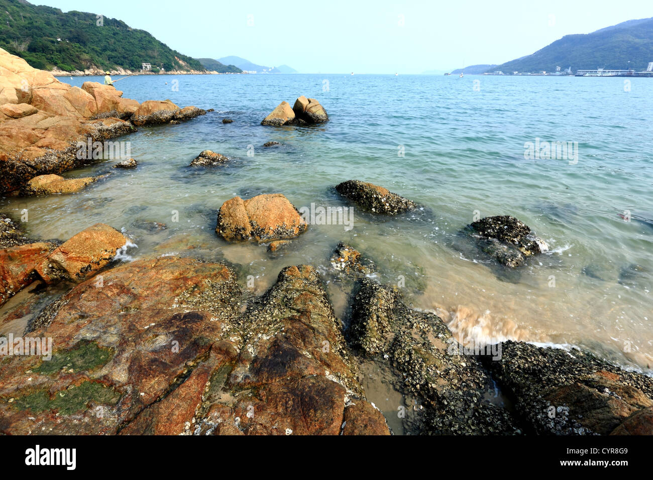 seaside with rock Stock Photo - Alamy