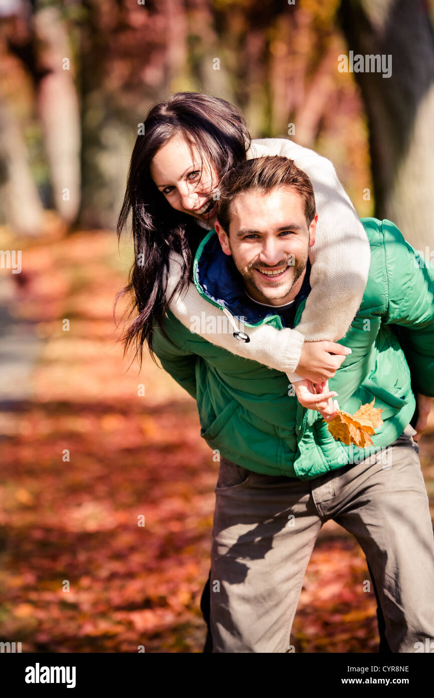 a young couple in the autumn park Stock Photo - Alamy
