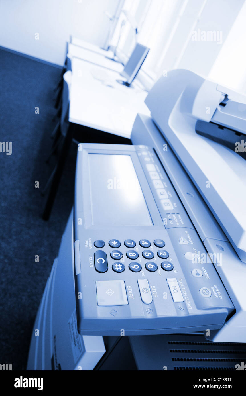 copier center or desktop in office showing paperwork concept Stock