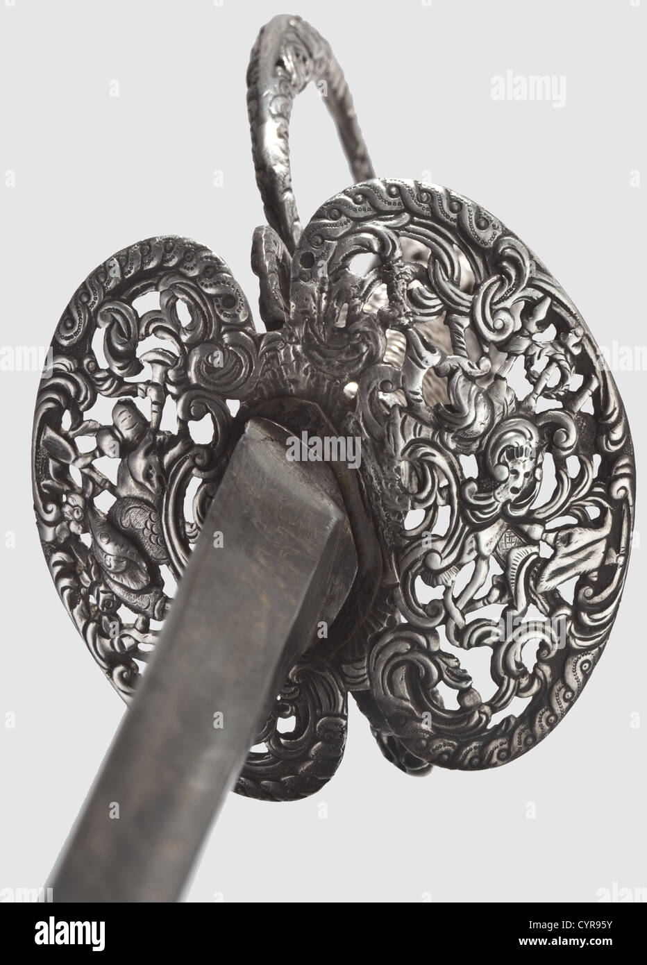 A French silver small-sword,Paris,circa 1760 Broad thrusting blade of hollow-triangular section,the forte etched with floral and ornamental motifs bearing traces of the original gilding. Openwork silver knuckle-bow hilt with relief decoration,asymmetric double-shell guard,and displaying rocaille and trophies-of-arms decoration. The front finger loop marked with crown/'V'. Twisted silver wire grip winding and Turks heads. Length 97.5 cm,historic,historical,18th century,sword,swords,weapons,arms,weapon,arm,fighting device,military,militaria,obje,Additional-Rights-Clearences-Not Available Stock Photo