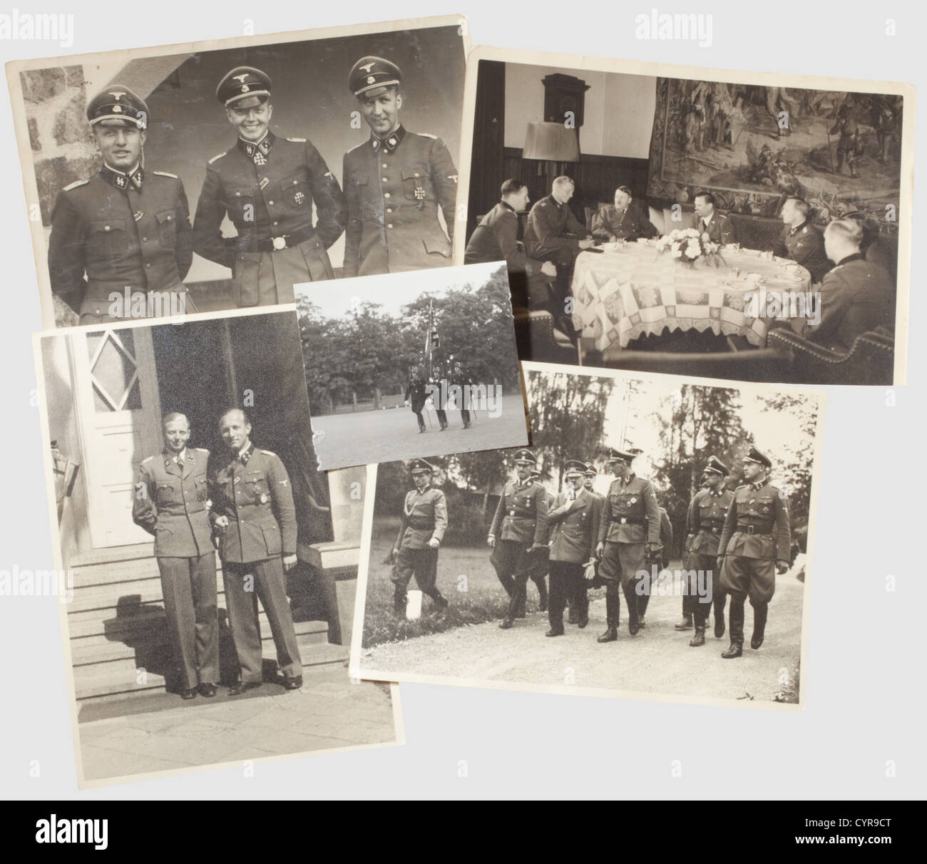 Fritz Darges - Fritz Klingenberg,Photographs and books Four large format photographs(12.5 X 17.5 cm two trimmed on the lower edge)each inscribed on the back,three with Hoffmann stamps: Darges and Klingenberg in front of the entrance to the Hohenlychen SS-Military Hospital in 1943. Darges,Klingenberg and Laackman at the Berghof in May 1941. 'Tea in the Berghof - from left to right,Major Engel - Hpstuf.(Captain)Klingenberg - The Führer - SS Gruf.(Major General)Schaub - F.D. - Laackman - May 1941'. Conference at Führer HQ,Wolfsschanze in 1943 with Kalte,Additional-Rights-Clearences-Not Available Stock Photo