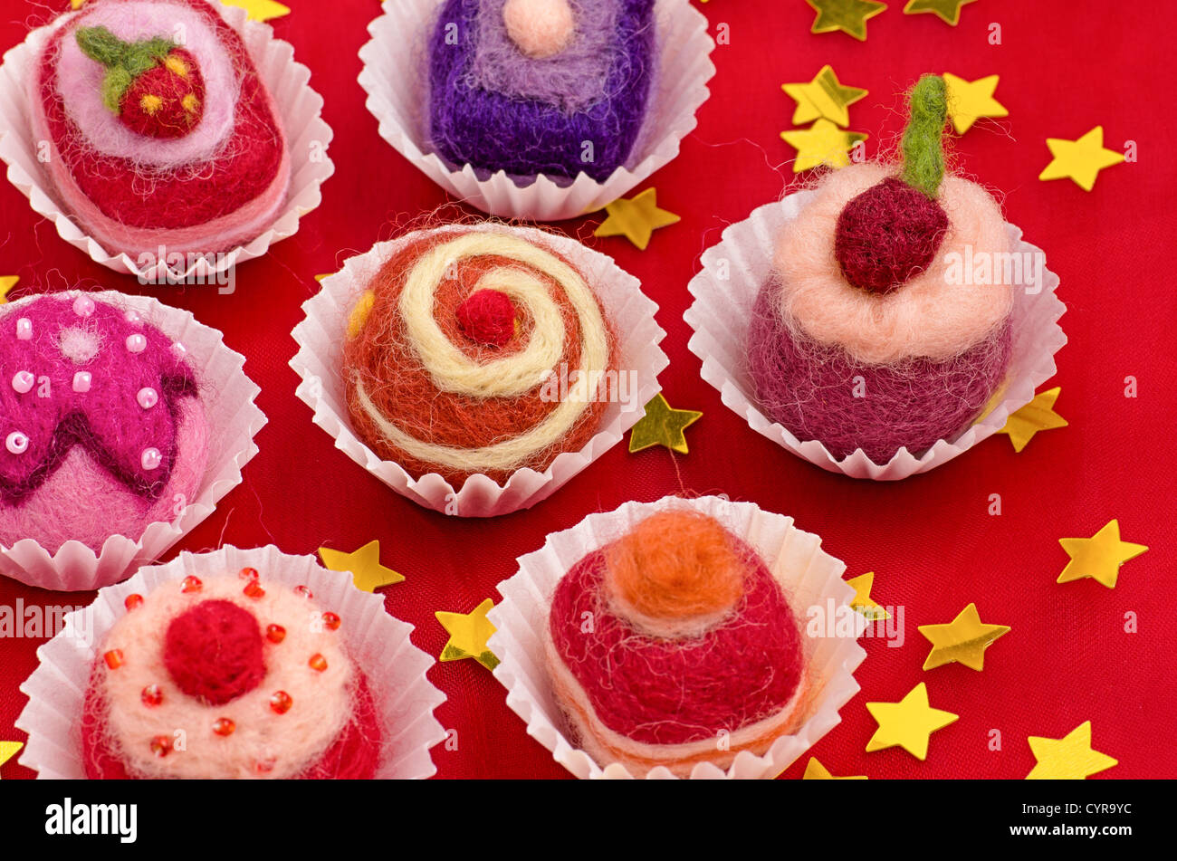 Christmassy assortment of colorful felt pralines Stock Photo