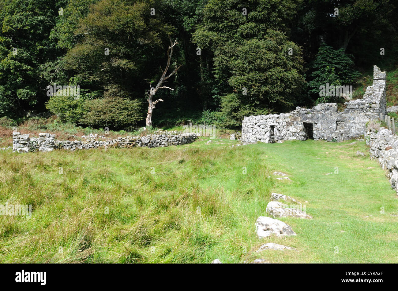 St Cybi's Well Caretakers cottage and stone animal enclosure Llangybi Gwynedd Wales Cymru UK GB Stock Photo