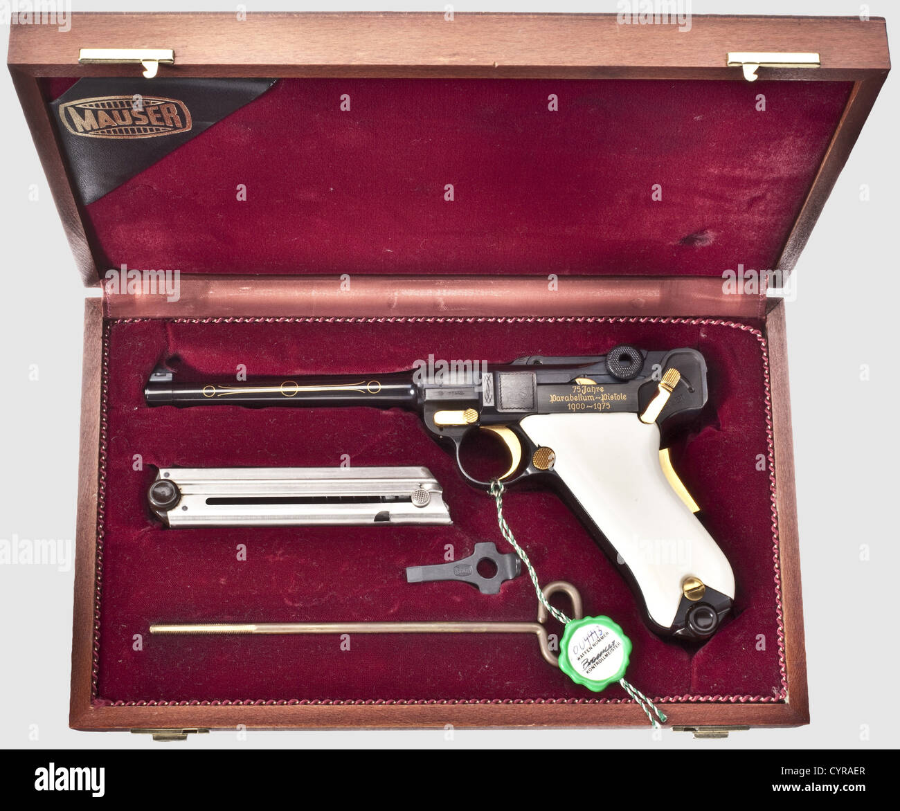 Mauser Parabellum,commemorative de luxe model,in its case,cal. 7.65 Parabellum,no. 10.004443. Matching numbers. Bright bore,barrel length 120 mm. Proof mark: 1973. Grip safety. Mauser barrel on front toggle link,barrel and fork with inlaid gold ornaments,on left side of frame in gold inlaid Gothic lettering '75 Jahre / Parabellum-Pistole / 1900 - 1975',on right side marked 'Meine Ehre heißt Treue'(Loyalty is my sense of honour). High gloss finish. Operational parts gold-plated. Ivory grip panels. Magazine. Comes with a red-brown wooden case,dimensions,Additional-Rights-Clearences-Not Available Stock Photo