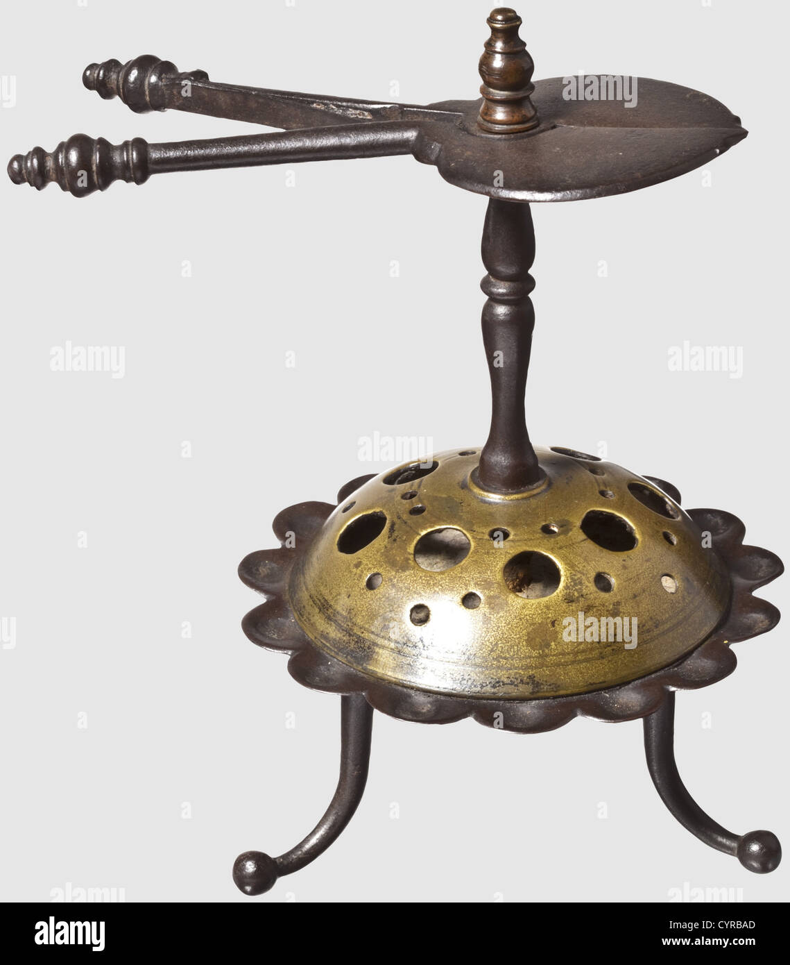 A German iron coiled candle holder, circa 1740 Drip pan with a