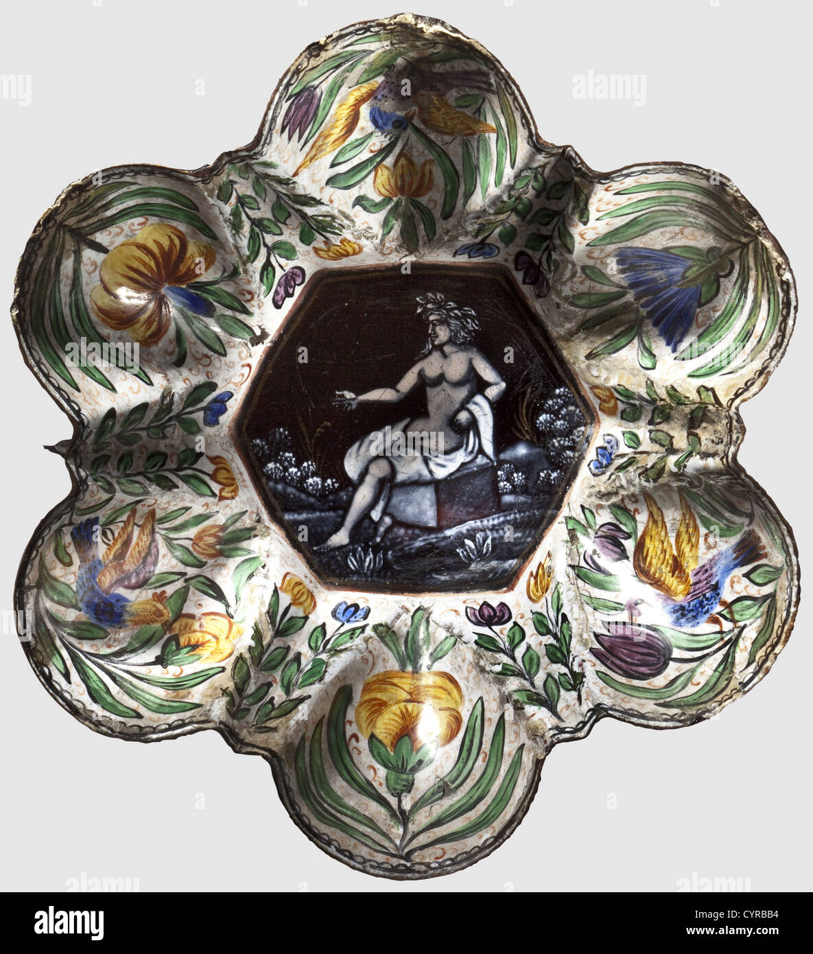 A French enameled tastevin, Limoges, circa 1600 An enameled copper cup formed with six bulging sections. Hexagonal central field displaying the figure of a seated woman in grisaille painting, coloured flowers and birds on the six surrounding cavities. The bottom painted with golden stars and decorative vines on a black background. Edges dented and restored in places. Diameter 13.5 cm, historic, historical,, 17th century, handicrafts, handcraft, craft, object, objects, stills, clipping, clippings, cut out, cut-out, cut-outs, fine arts, art, artful, Additional-Rights-Clearences-Not Available Stock Photo