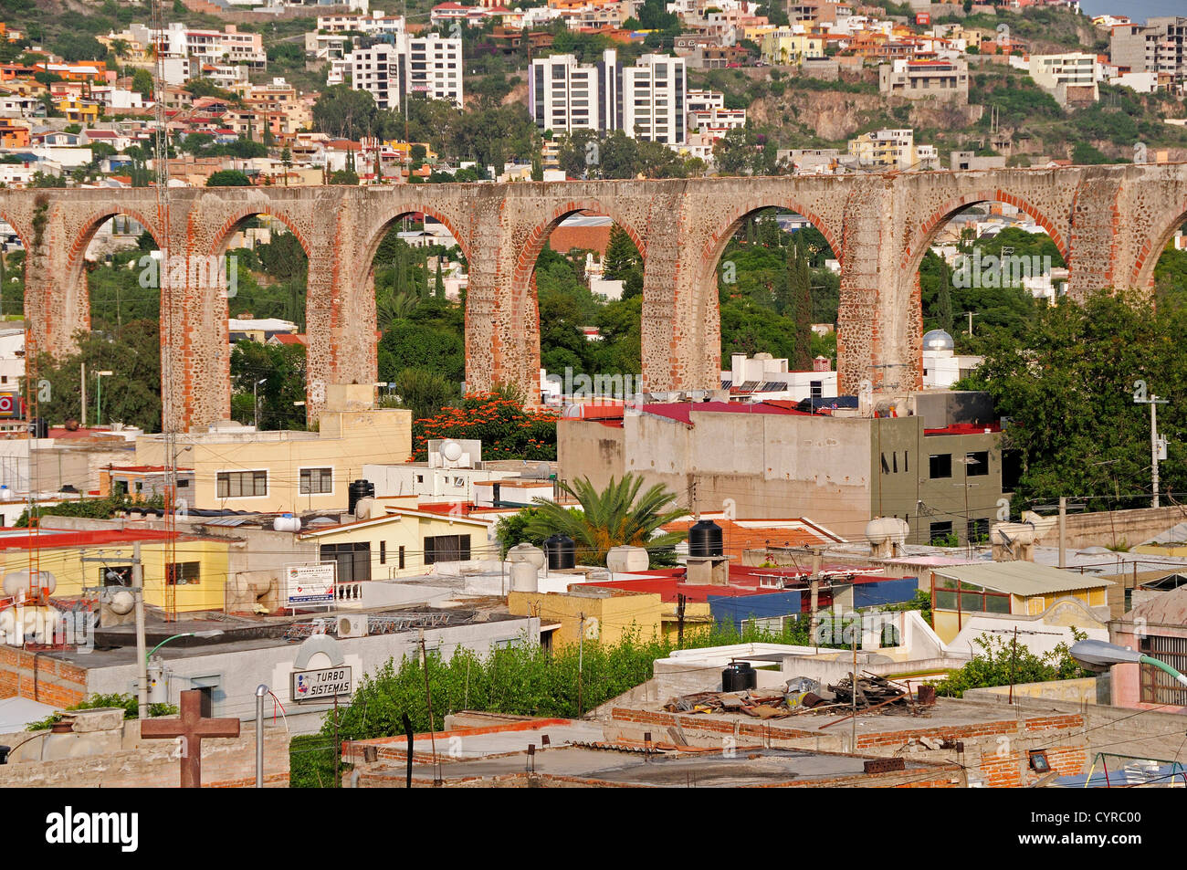 Mexico, Bajio, Queretaro, City view with aquaduct and housing from mirador. Stock Photo