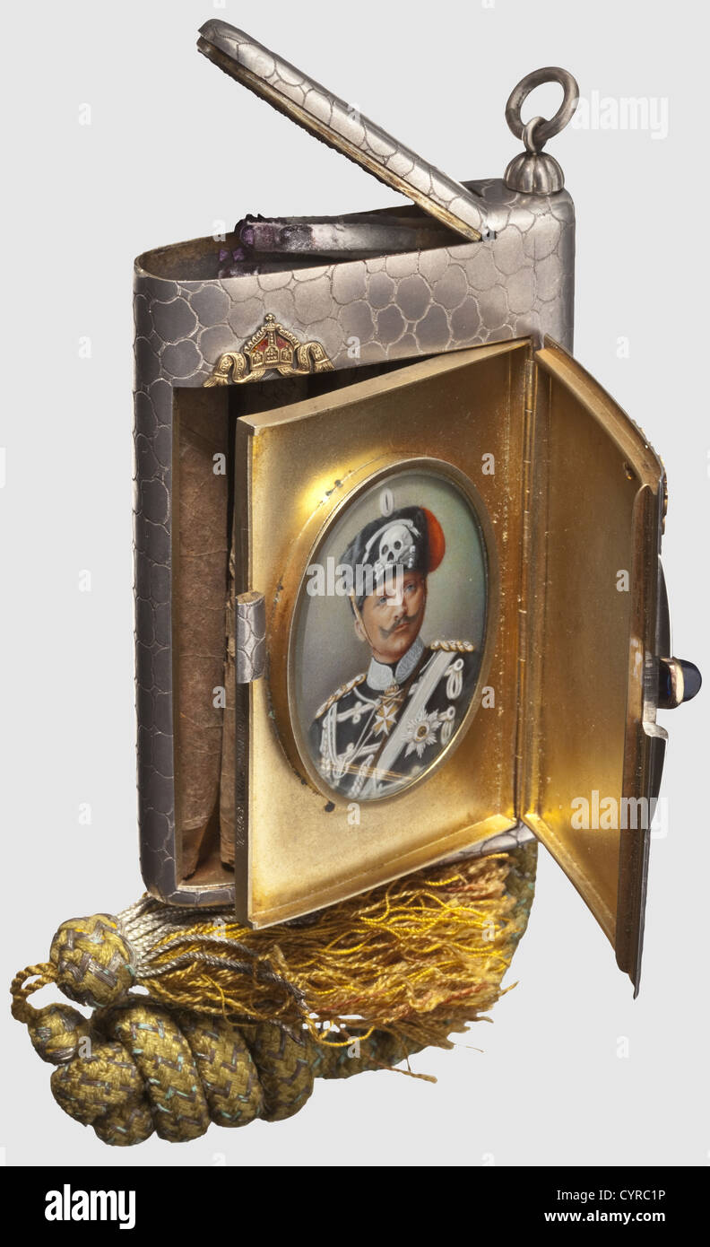 General Field Marshal August von Mackensen(1849 - 1945),a cigarette case presented by Kaiser Wilhelm II in 1907 Court jeweller Joh. Wagner & Sohn,Berlin. Silver,the interior gilt,the exterior engraved in a reptile's skin pattern,separate compartment for matches. Two-part(!),cipher made from gold and enamel,the imperial crown on the case,the cipher 'WR' on the lid. Blue gemstone cabochon. The lid with a additional hinged interior cover,thereon a dedication inscription 'Meinem lieben von Mackensen mit den besten Neujahrswünschen - Wilhelm I.R. - Potsdam,Additional-Rights-Clearences-Not Available Stock Photo