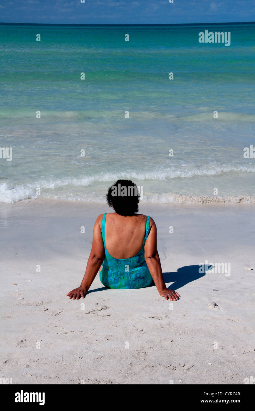 Senior woman relaxing on the tropical beach Stock Photo - Alamy