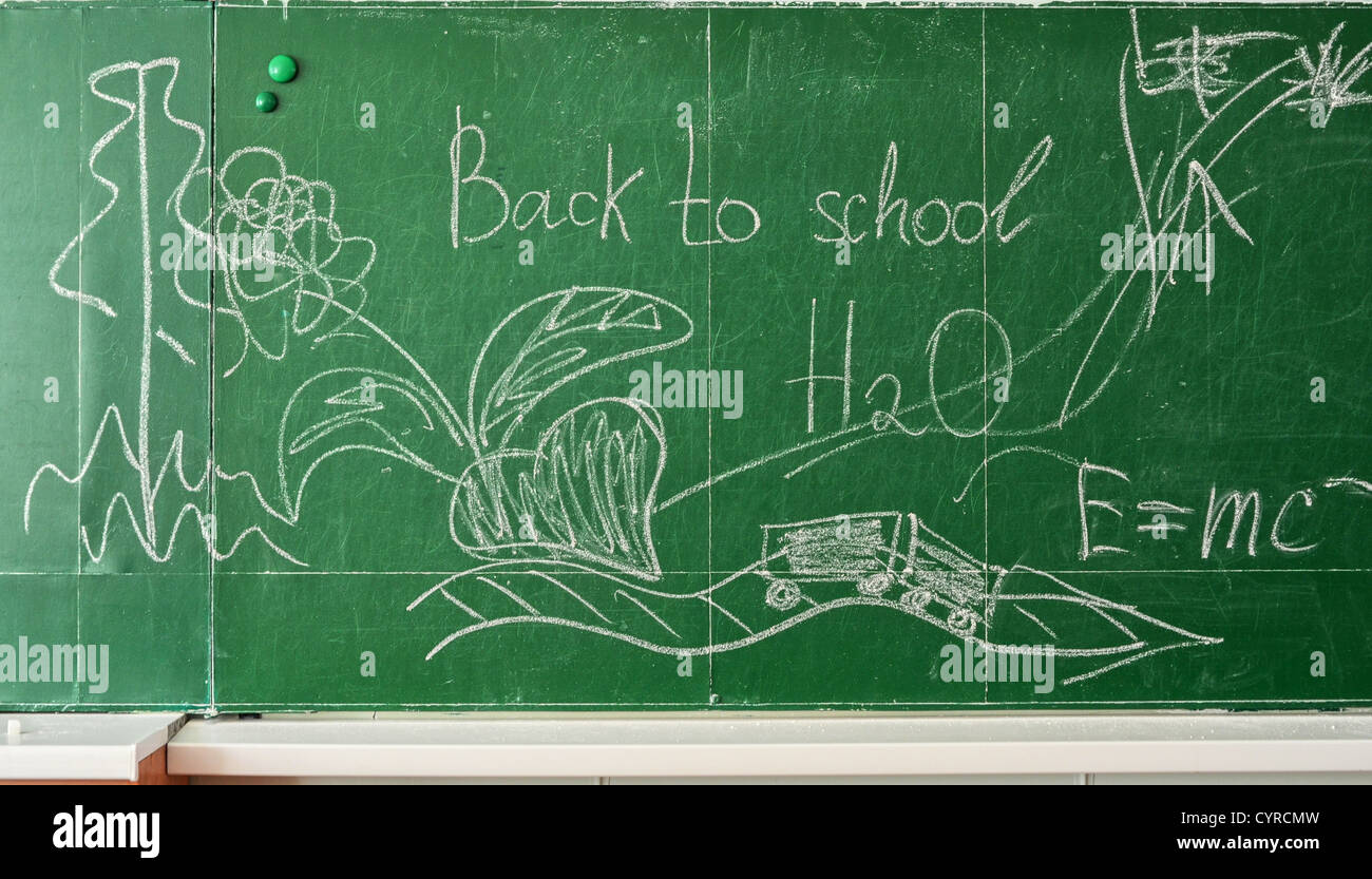 Green chalk blackboard written Back To School with white chalk Stock ...