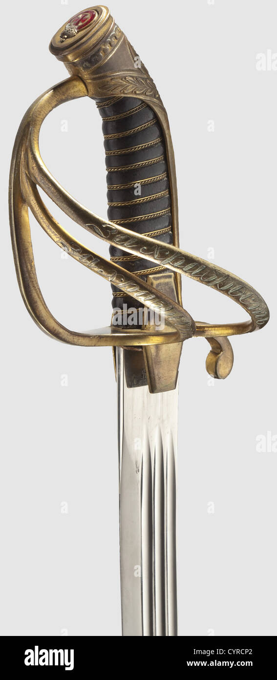 A model 1811/1914 sabre for Russian Navy Officers,Bearing the Order of St.Anne for Bravery Curved,nickel-plated,single-edged blade with fullers and a double-edged point.The maker's mark,'F.Fichte Solingen' is stamped on the ricasso.Gilded brass hilt bearing the Tsar's cipher 'NII' and enamelled overlay of the Order of St.Anne(chipped).The Cyrillic monogram 'B.A.' engraved on the languet.Two guard bars engraved with the Cyrillic inscription,'For Bravery'.Leather-covered grip with brass wire winding.Leather covered wooden scabbard with brass mounti,Additional-Rights-Clearences-Not Available Stock Photo