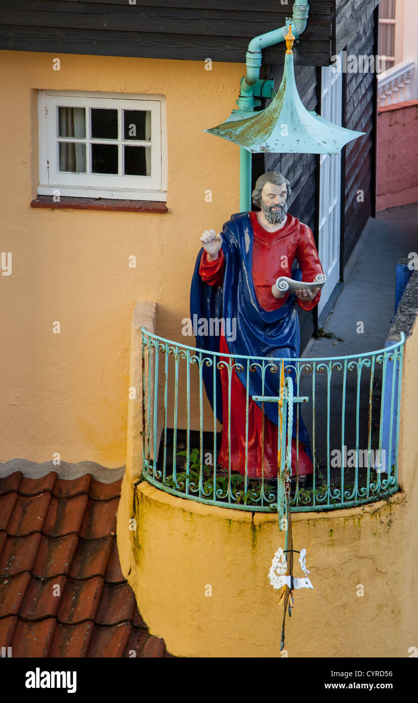 St Peter statue on the Toll House at Portmeirion, Gwynedd, Wales Stock Photo