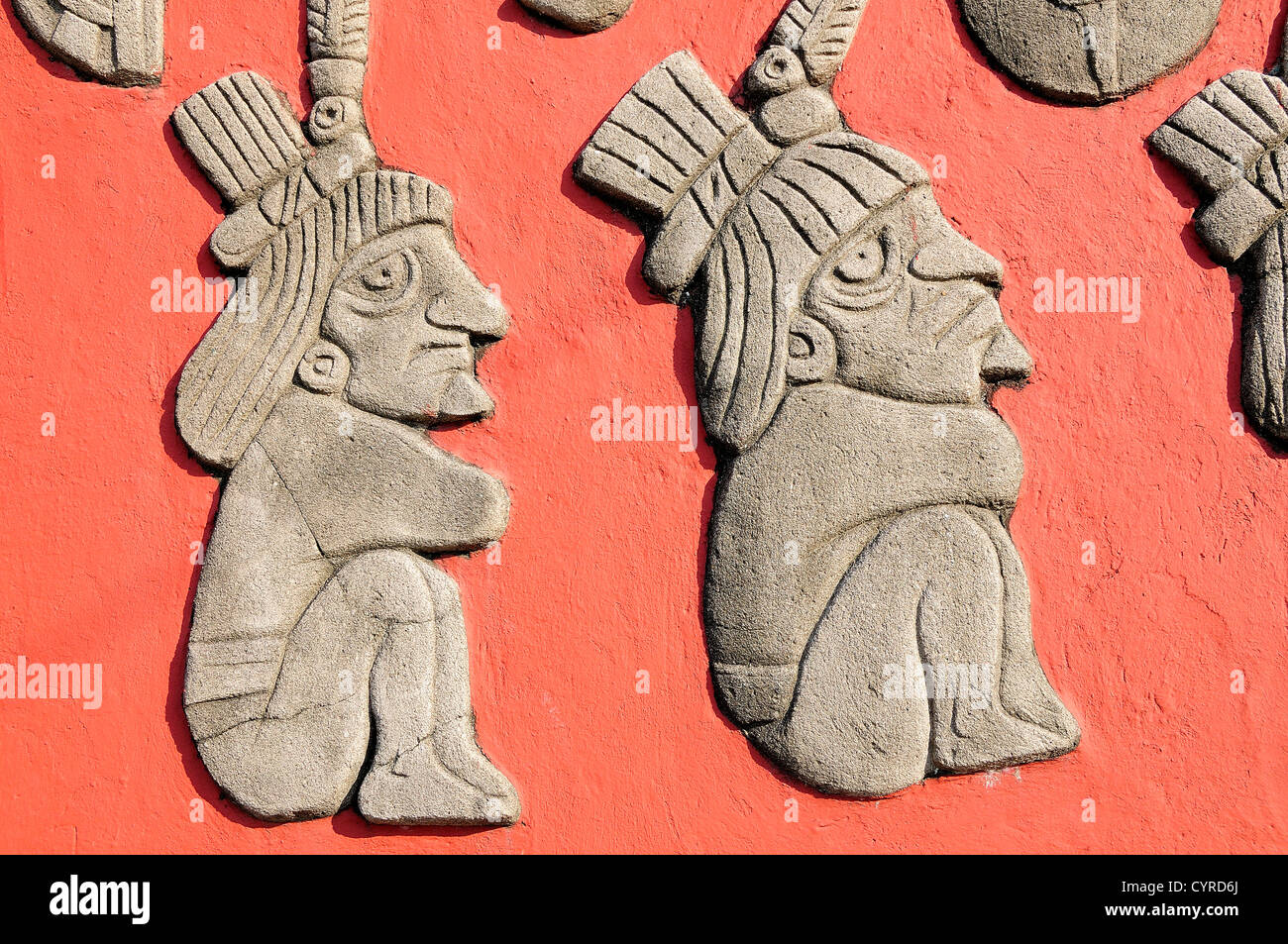 Relief carving of Totonac figures on the Mural Cultural Totonaca in the Zocalo. American  Hispanic Latin America Latino Mexican Stock Photo