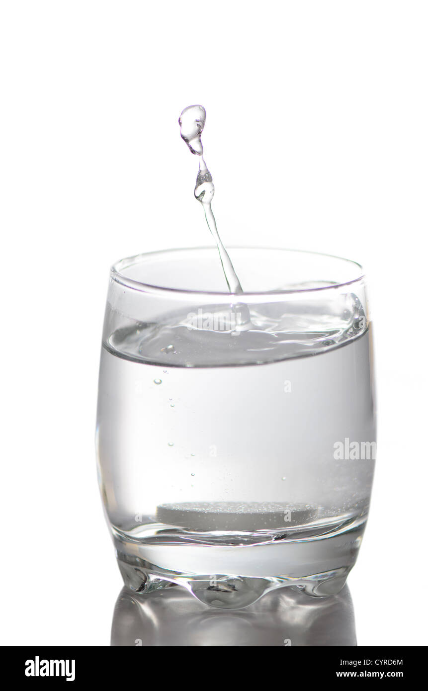 a water splash in a glass with calcium isolated on white Stock Photo