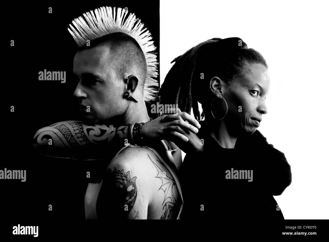 Caucasian Man With Mohawk And African American Woman With