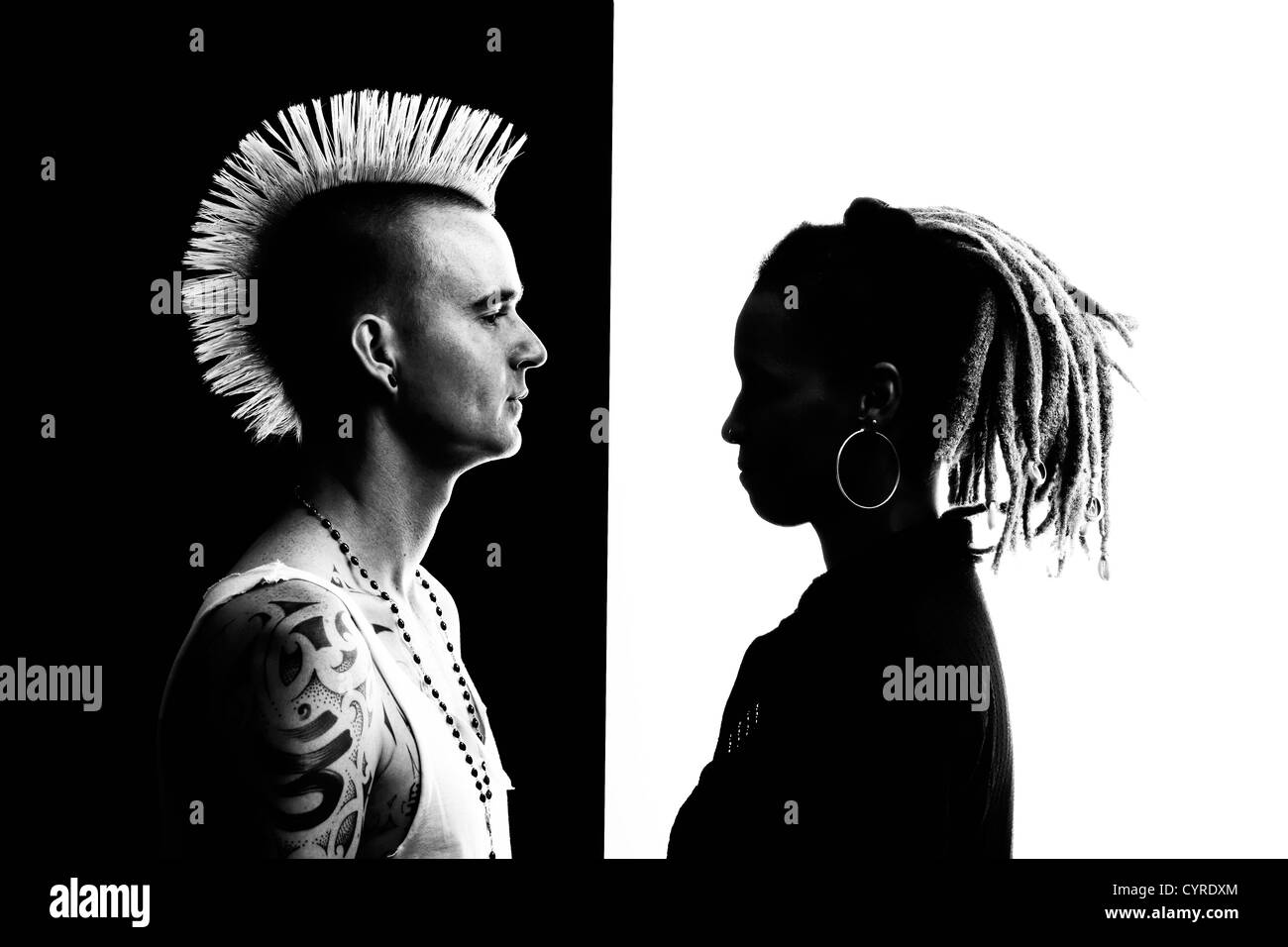 Caucasian Man with Mohawk and African-American Woman with Dreadlocks Stock Photo