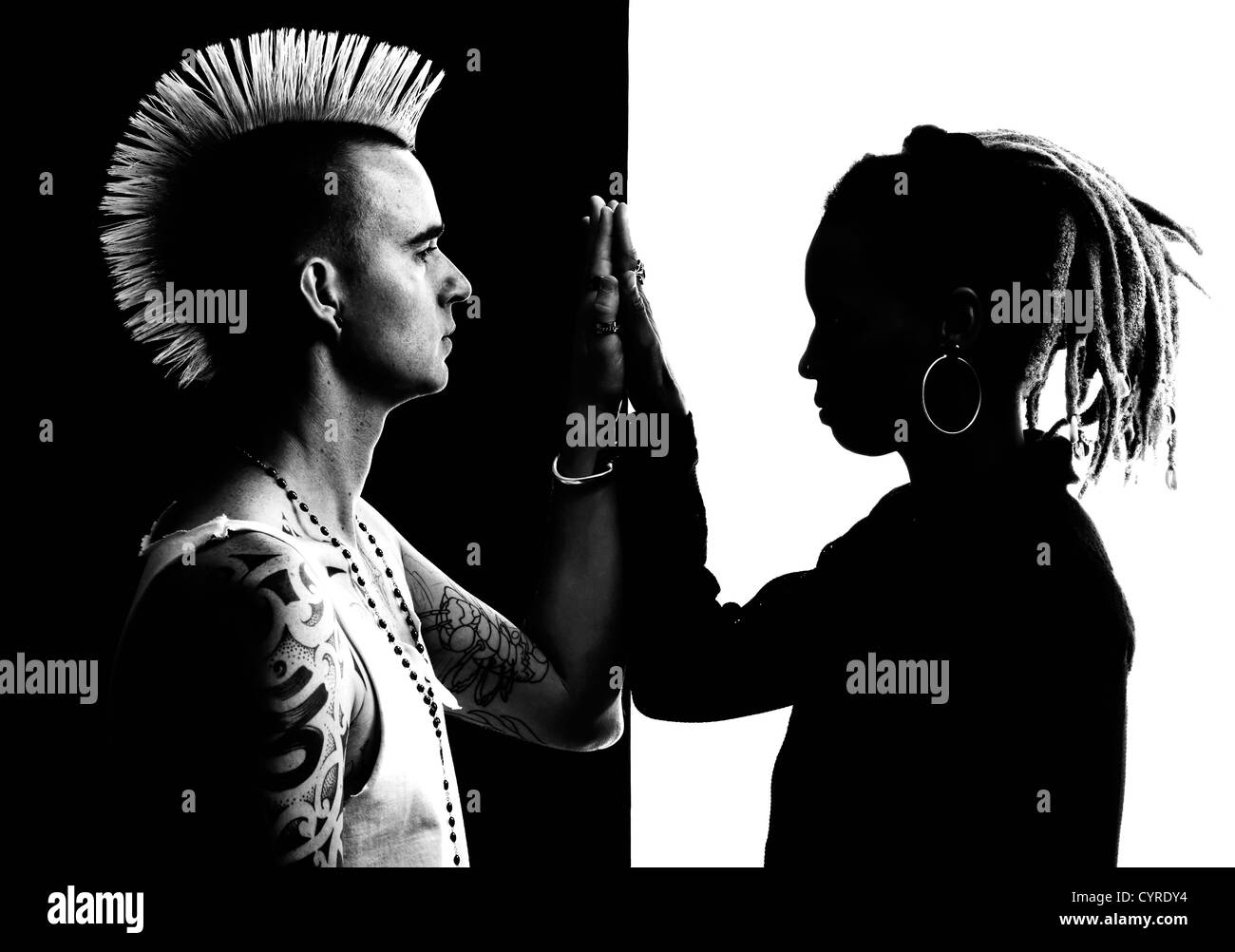 Caucasian Man With Mohawk And African American Woman With