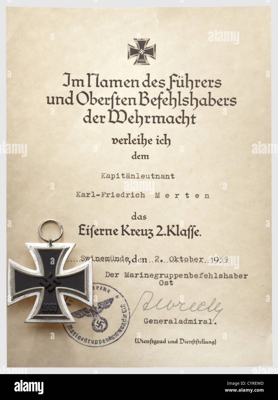 Karl-Friedrich Merten, an Iron Cross 2nd Class of 1939 with award document In an outstanding state of preservation. With a section of ribbon. The document dated 2 October 1939 and stamped by Naval Group Command East with signature in ink of the commanding officer, Naval Group Command East Conrad Albrecht, historic, historical, 1930s, 20th century, navy, naval forces, military, militaria, branch of service, branches of service, armed forces, armed service, object, objects, stills, clipping, clippings, cut out, cut-out, cut-outs, document, documents, Additional-Rights-Clearences-Not Available Stock Photo