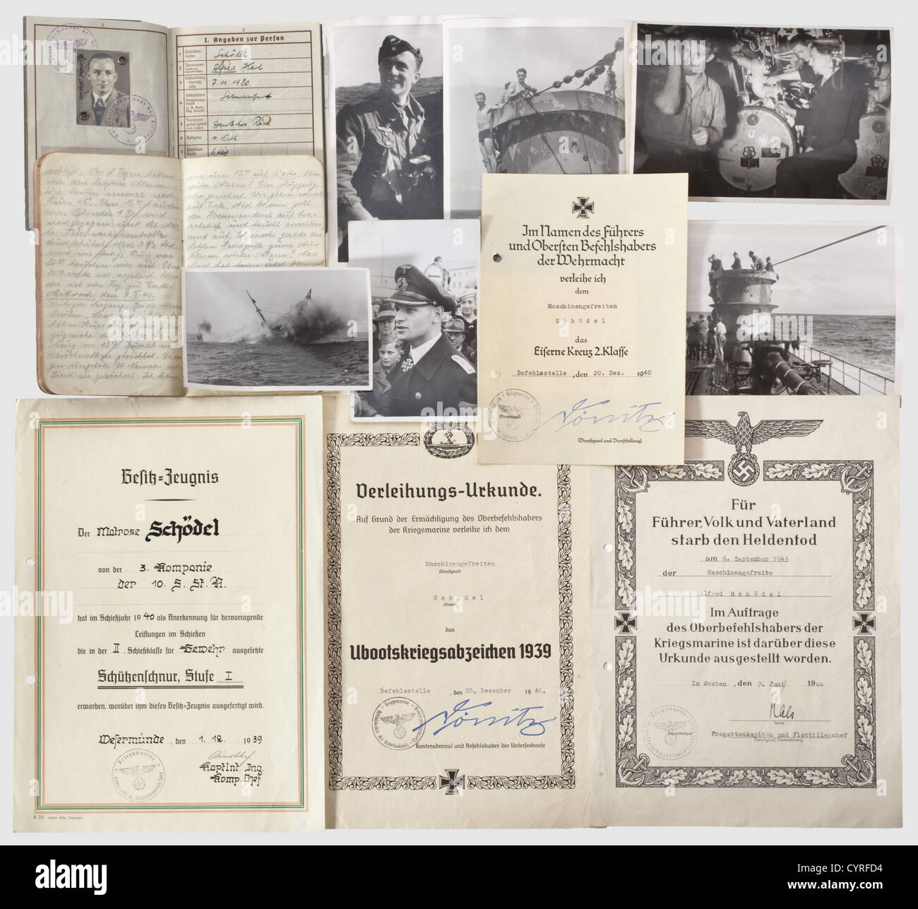 Documents and photos,of a Machinist First Class aboard 'U-43' Six small daily log books of his cruises with technical,nautical and private notes,tonnage sunk etc. Also,his Wehrpass dated 1 May 1939 with entries for U-Boat Flotilla 2,the U-Boat War Badge,Iron Cross 1st and 2nd Classes. Award documents for the Shooting Lanyard 1st Class,the U-Boat War Badge and the Iron Cross 2nd Class of 1939(with possession document). A pocket calendar from 'U-43' for the year 1943. Death document(Heldentodurkunde)and letters of condolence from his flotilla chief,Kre,Additional-Rights-Clearences-Not Available Stock Photo