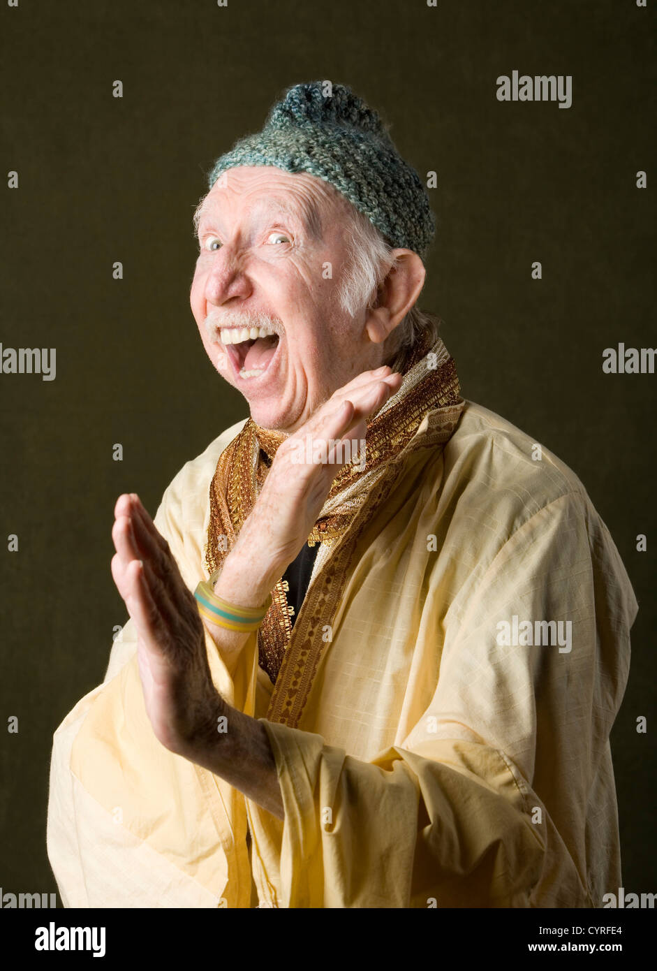 Wise guru using martial arts to defend himaself Stock Photo - Alamy