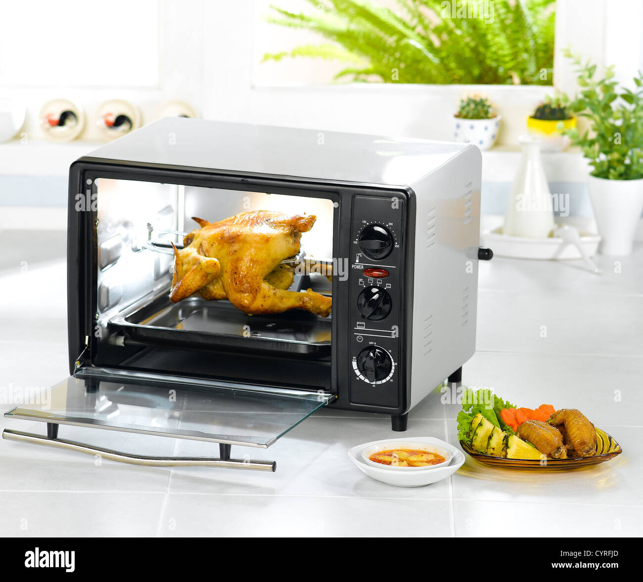 Electric chicken roast oven fast and convenience kitchenware Stock