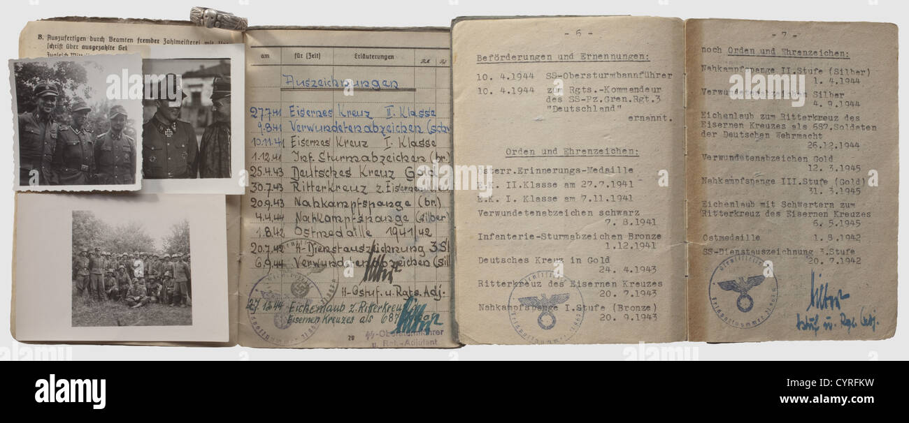 Swords Winner SS-Obersturmbannführer Günther Wisliceny,Soldbuch,Wehrpass,and Death's Head Ring The Soldbuch(identity/pay document)dated 21 September 1944 with ID photo in uniform and 15 entries for awards,including the Knight's Cross with Oak Leaves and Swords,the Knight's Cross with Oak Leaves,the Knight's Cross,the German Cross in Gold,the Close Combat Clasp in Bronze,Silver and Gold,the Wound Badge in Black,Silver and Gold,and the SS Long Service Award 3rd Grade. Typewritten replacement Wehrpass(military registration book)dated 8 May 1945 wit,Additional-Rights-Clearences-Not Available Stock Photo