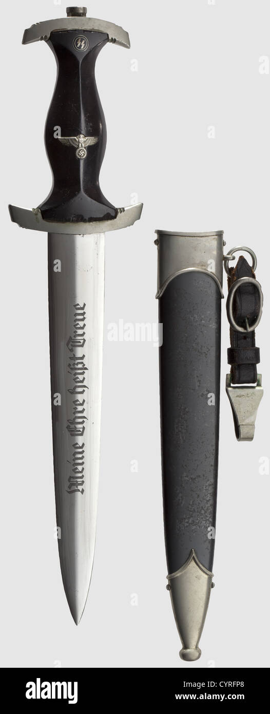 A model 34 SS honour dagger,with Himmler dedication The blade etched on the obverse side with the motto 'Meine Ehre heißt Treue'(My Honour is Loyalty),on the reverse side with dedication 'In herzlicher Kameradschaft H. Himmler'(In Cordial Comradeship H. Himmler)and struck with Eickhorn manufacturer's mark,black wooden grip(restored,small scratches). Nickel-silver guard and pommel,blued iron scabbard with nickel-silver fittings,black leather hanger. Length 35 cm. Very rare dagger,historic,historical,1930s,1930s,20th century,thrusting,thrustings,,Additional-Rights-Clearences-Not Available Stock Photo