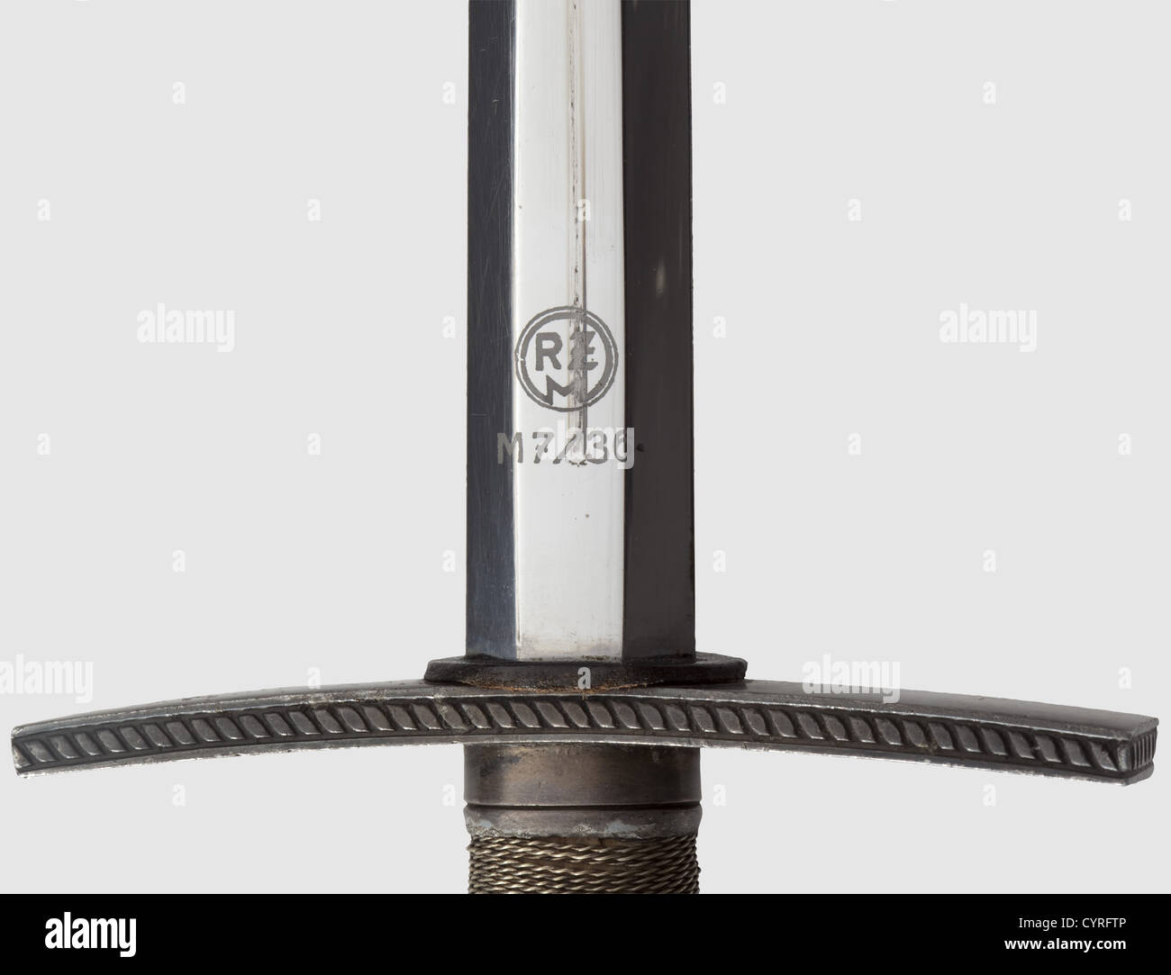 A dagger M 37 for leaders, manufacturer M 7/36, E. & F. Hörster, Solingen  Very good bright blade, the obverse with etched motto Blut und Ehre!  (Blood and Honour!), the reverse etched