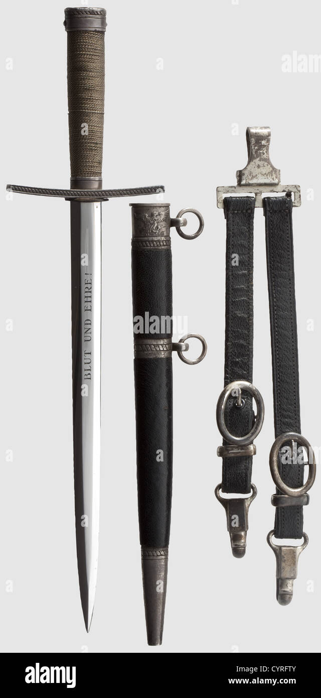 A model 37 Hitler Youth leader's dagger,with hanger With polished blade,the obverse side etched with the motto 'Blut und Ehre!'(Blood and Honour!),and the reverse stamped 'RZM' and 'M 7/36' for Hörster Solingen,with silver-plated crossguard and iron pommel,the grip bound with wire. Iron scabbard covered with black leather and silver-plated fittings. Partially tarnished. Length 34.5 cm. Black leather hanger with silver-plated metal mounts. Very rare dagger,historic,historical,1930s,1930s,20th century,thrusting,thrustings,hand weapon,hand weapons,,Additional-Rights-Clearences-Not Available Stock Photo