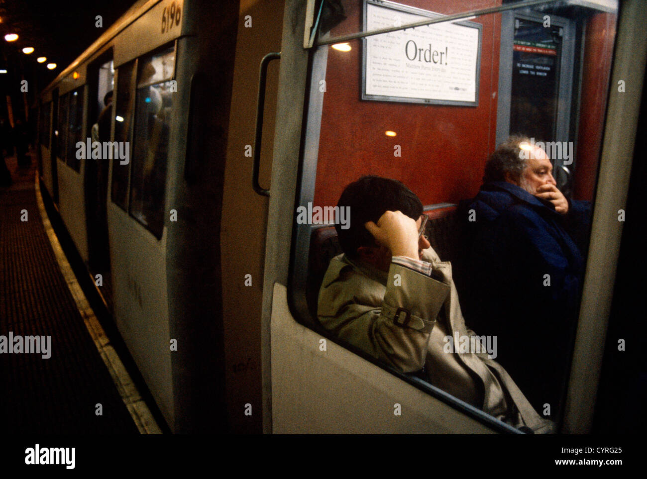 Grim Faces In 90s Tube Train On Underground Commuter Train During Rush Hour At Bank Station City Of London Stock Photo Alamy