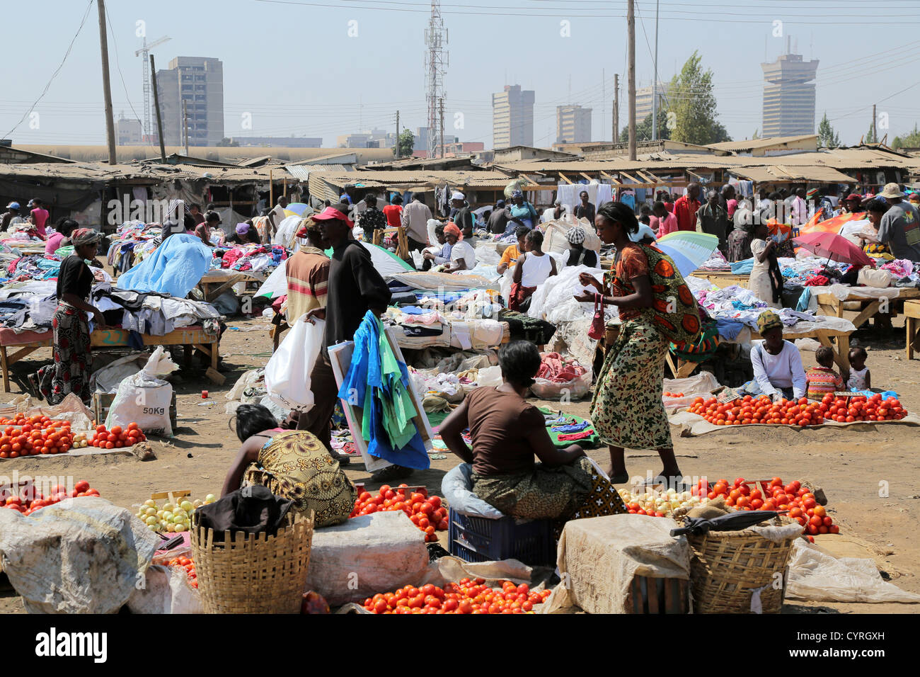 Old-Soweto market in Lusaka, Zambia. Skyscrapers of the city in the background, Findeco house at the right Stock Photo