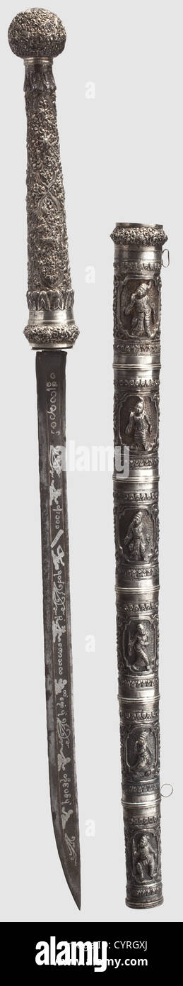 A Burmese silver-mounted ceremonial dha,circa 1900 Slightly curved(somewhat stained)single-edged blade with decorative silver figure and script inlays on both sides. Silver grip with a ball-shaped pommel,embossed with extremely lavish floral decoration in relief. The multi-piece silver scabbard shows embossed relief figures within floral decoration on both sides. Length 100.5 cm. Unusual,beautifully worked,dha,historic,historical,1900s,20th century,19th century,Indonesian archipelago,Indonesia,Far East,Asia,Asian,ethnology,ethnicity,ethnic,t,Additional-Rights-Clearences-Not Available Stock Photo