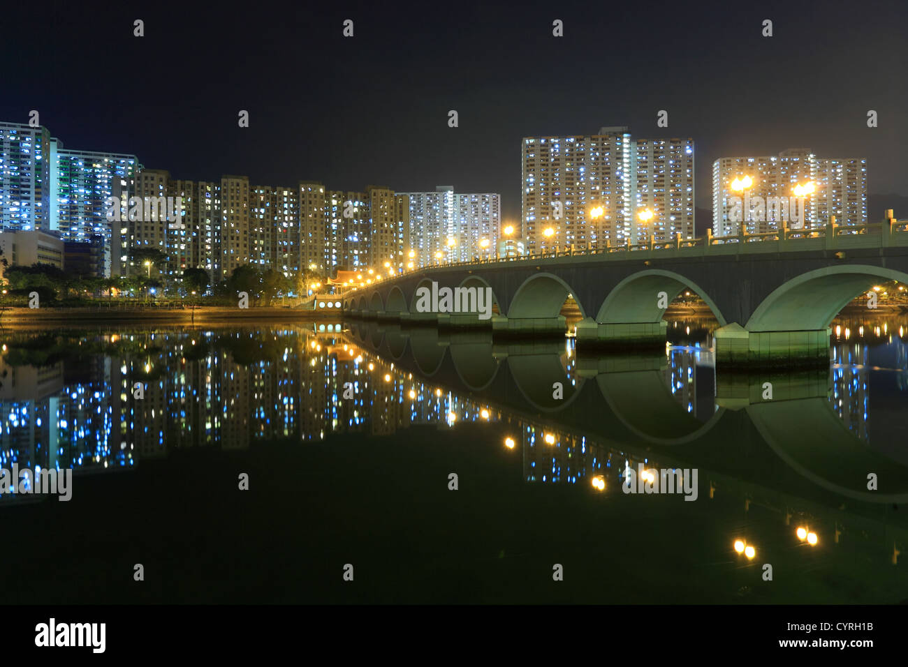 bridge and partment Buildings in Hong Kong at night Stock Photo - Alamy