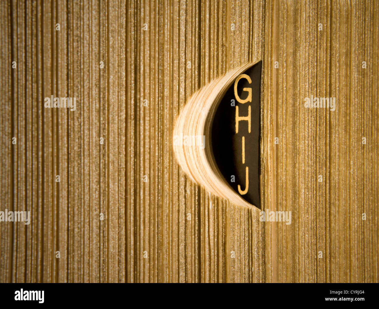 Old fashion dictionary index tab in golden letters Stock Photo Alamy