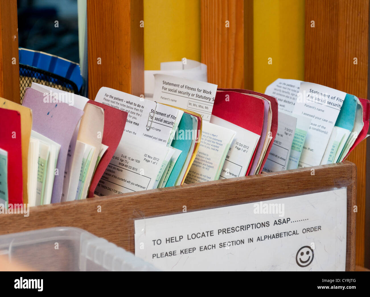 Prescriptions and Fitness for Work statements for patients at a GP surgery. Stock Photo