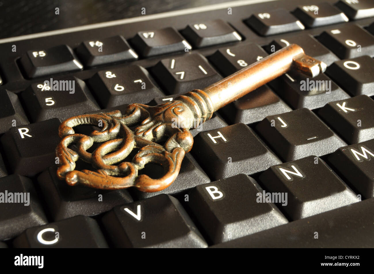 internet security concept with padlock on black keyboard Stock Photo