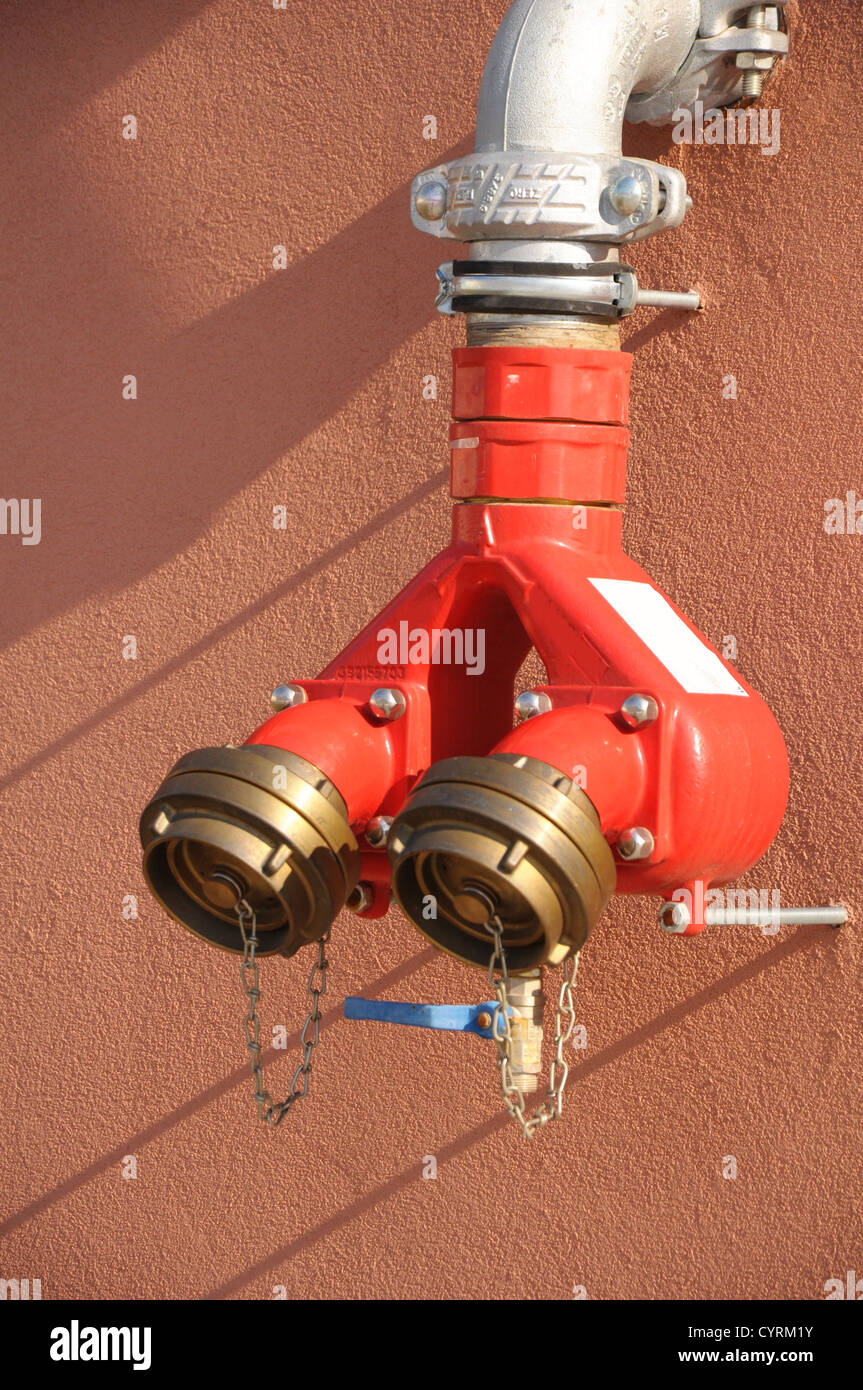 hydrant on a wall with copyspace showing fire fighter concept Stock ...