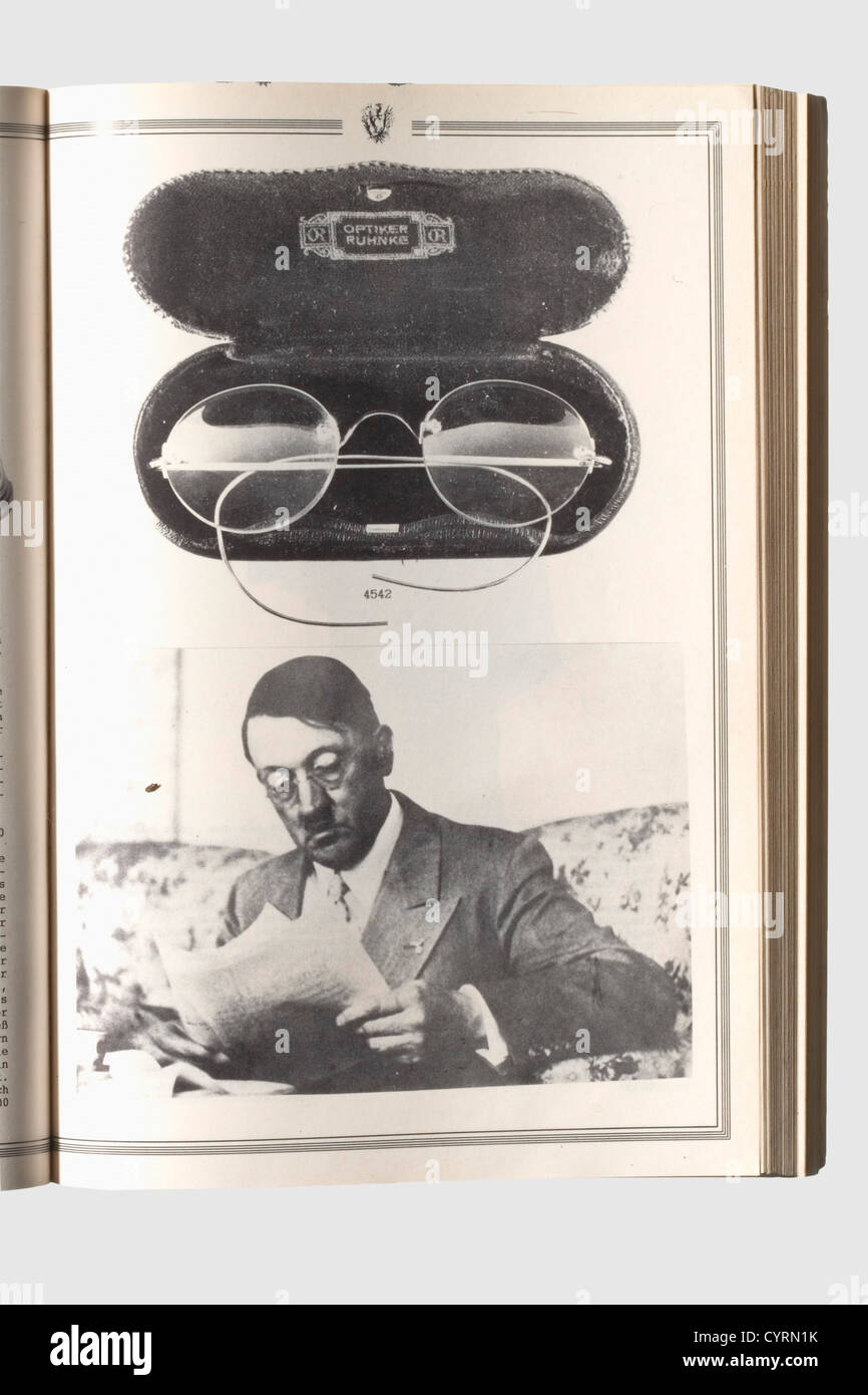 Adolf Hitler,reading glasses with gold frame and case Frameless issue,each lense with 2.5 dioptres and mostly free of scratches. The golden temples with hallmarks '585',the bridge(small repair)with an additional mark 'OR' of the Berlin/Hamburg optician Ruhnke. In a shallow,black leather case lined with dark blue velvet and manufacturer's inscription 'Optiker Ruhnke' in the lid. Hitler wore these glasses from about the mid-1920s until the historic,historical,people,1930s,20th century,NS,National Socialism,Nazism,Third Reich,German Reich,Germany,,Additional-Rights-Clearences-Not Available Stock Photo