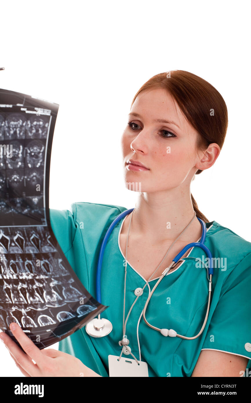 Female doctor looking at xray picture Stock Photo - Alamy