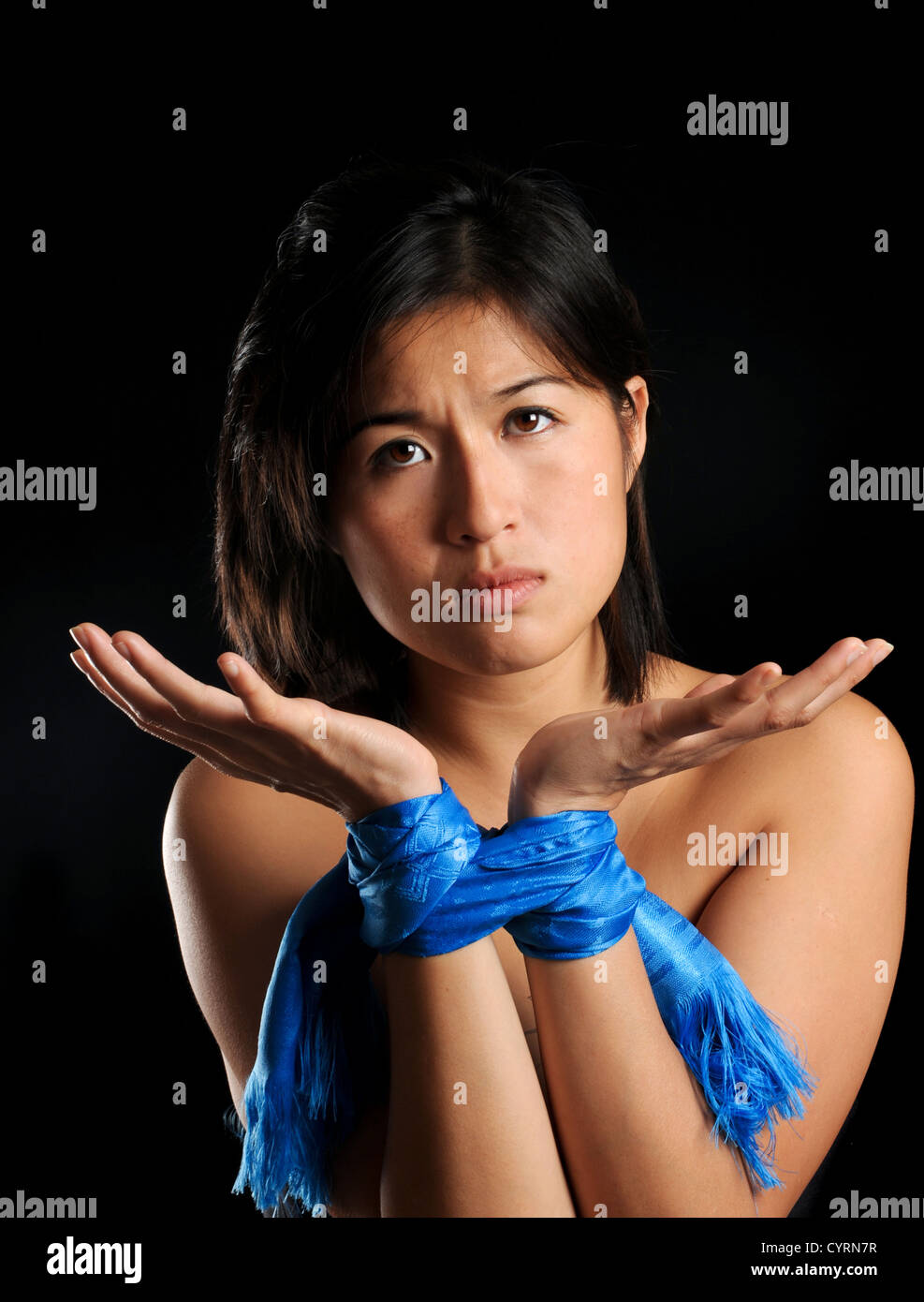 Asian girl tied up against her will pleads for release Stock Photo - Alamy