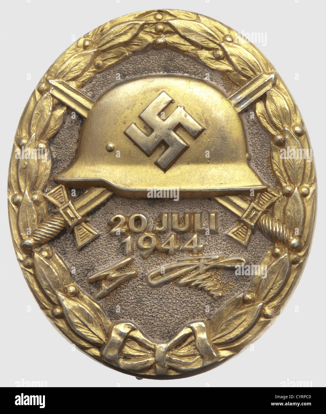 A Wound Badge "20 July 1944" in Gold,maker's mark "2" by Juncker in Berlin Silver,partially gilded. Reverse with hallmark "800" and "2" for Juncker,Berlin. The gilding slightly worn off,small scratches on the back(from assaying?),otherwise in outstanding condition. Dimensions 44.30 x 37.00 mm. Weight 39.74 grams(Nie 7.04.16 a1). Extremely rare. Only 23 or 24 have been awarded in the three levels,gold,silver,and black. The gold level has presumably been awarded four times posthumously and one time to General Bodenschatz,two of which are confirmed of s,Additional-Rights-Clearences-Not Available Stock Photo