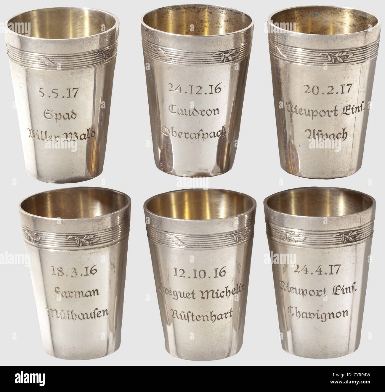 Ernst Udet(1896-1941),six silver cups for his first air victories 1916/17 Conical silver cups with gilt interiors,with laurel wreath below the lip.All cups stamped with hallmark '800' with jeweller's mark 'WB' and number '20393' at base.The front engraved with the date,the type of enemy aircraft and the place where the air victory took place,the back engraved with Udet's unit(once single-seater fighter detachment 'Habsheim' and five times 'Jasta 15').Height 4.38 cm each,total weight 138 g.Also a list of his 62 air victories and the air victories of J,Additional-Rights-Clearences-Not Available Stock Photo
